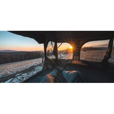 jakub_inside_the_tent_on_snowy_day